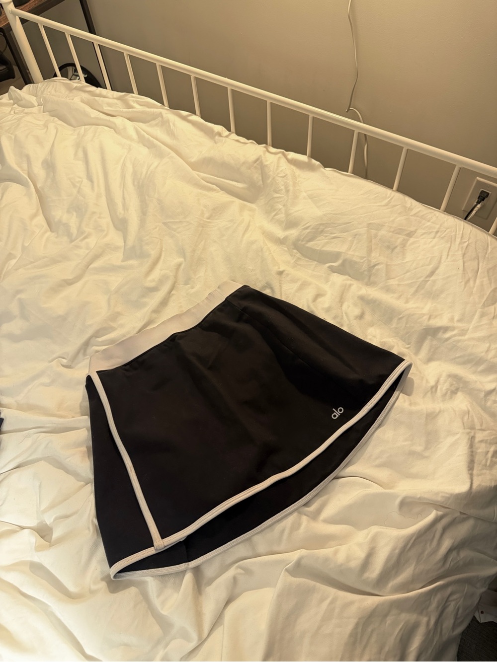 ALO Yoga Black Skirt with White Tag Detail
